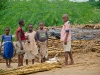 children-beside-their-fallen-house-rice-packages-given-by-iris-africa